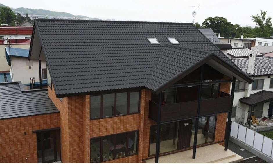 Modern home with JS Roofing premium stone coated roofing sheets installed